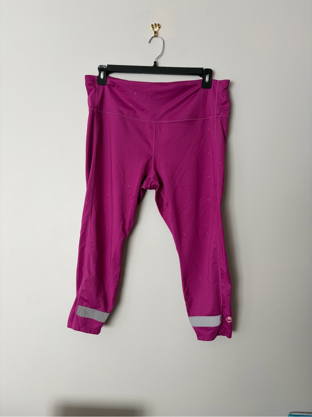 Nike Women’s Magenta Capri Leggings with Reflective Ankles